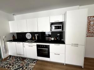 Køkken eller tekøkken på Le Ginkgo Biloba, 2P Wifi