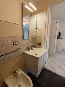 Koupelna v ubytování Terrazza delle rose + 13 fotografií