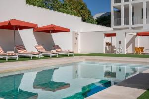 Πισίνα στο ή κοντά στο Vila Catarina Luxury Apartments