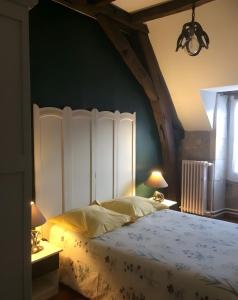 Postel nebo postele na pokoji v ubytování Gite Le Ry De Pouzioux