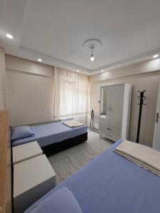 Postel nebo postele na pokoji v ubytování apart