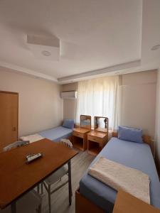 Postel nebo postele na pokoji v ubytování apart