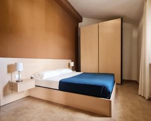 Postel nebo postele na pokoji v ubytování Il Ginepro Oasi Montana