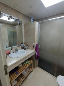 a bathroom with a sink and a shower at Apartamento Residencial mojacar in Mojácar +22 photos