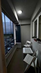 Posezení v ubytování Dinjas place + 7 fotografií