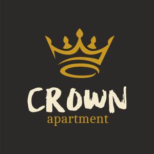 een kroon op een zwarte achtergrond met de woorden kroonappartement bij Crown Apartment Park View in Ukmergė