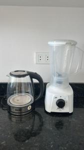 a blender sitting on top of a counter at Altamira Surubi-i in Estancia Sarubi