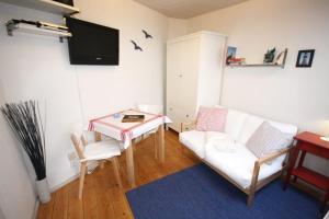 Μια τηλεόραση ή/και κέντρο ψυχαγωγίας στο Warnemünde Ferienbungalow Diana 38559