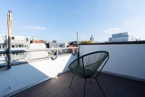 Μπαλκόνι ή βεράντα στο HunteQuartier Green City Apartment in bester Lage