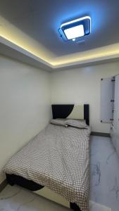 Postel nebo postele na pokoji v ubytování Silang Guest house