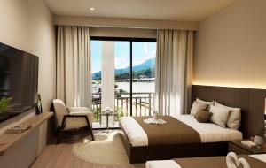 Ένα ή περισσότερα κρεβάτια σε δωμάτιο στο Tulip Elegant Riverside Vangvieng