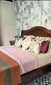 Ένα ή περισσότερα κρεβάτια σε δωμάτιο στο Laman Zavilla Dhoma 2