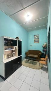 Posezení v ubytování Guest House Anugerah