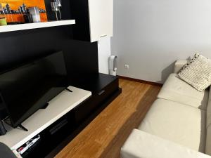 Χώρος καθιστικού στο Apartamento Jardim do Sol
