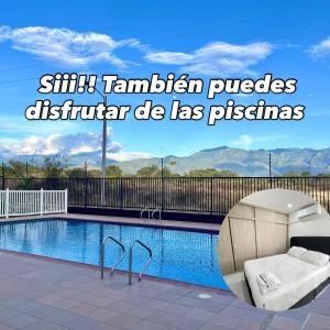a swimming pool with a chaise lounge next to at Loft Moderno con aire , con piscina T12 in Neiva