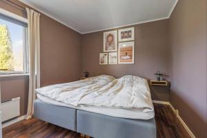 Postel nebo postele na pokoji v ubytování Summer house in a fun area