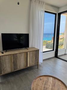 Et tv og/eller underholdning på Forti Villa C + 26 billeder