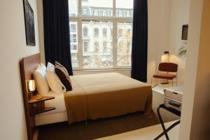 Ένα ή περισσότερα κρεβάτια σε δωμάτιο στο A Place - Boutique Hotel - Meir 24