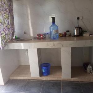 Kuchyň nebo kuchyňský kout v ubytování Marcello Gardens- Mulutu Market