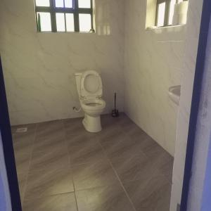 Koupelna v ubytování Marcello Gardens- Mulutu Market