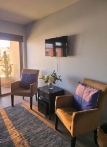 Posezení v ubytování Summertide Beachside Retreat