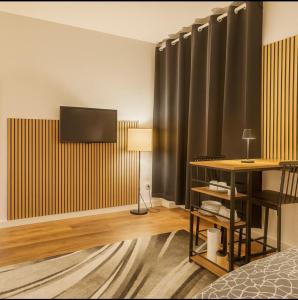 TV a/nebo společenská místnost v ubytování CityNest Hannover O15