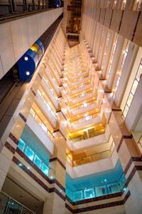 a view of a lobby with a staircase in a building at فندق تارا المحبس - محبس الجن - in Makkah