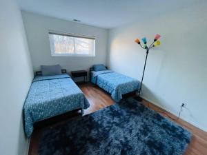 Ένα ή περισσότερα κρεβάτια σε δωμάτιο στο Cozy 2br, 2ba Apartment In Elkins Park +10 φωτογραφίες