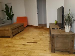 Μια τηλεόραση ή/και κέντρο ψυχαγωγίας στο Longueuil Cozy spot