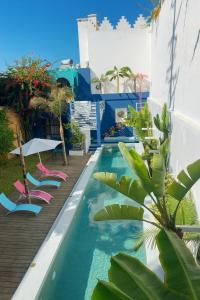 Bazén v ubytování Riad Maison de ville piscine privée nebo v jeho okolí