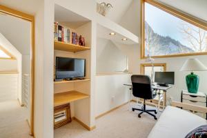 a room with a desk and a computer and a window at Mtn-View Deck, Workspace! Walkable Frisco Condo in Frisco