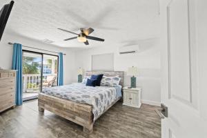 Ένα ή περισσότερα κρεβάτια σε δωμάτιο στο The Gulfview Grande