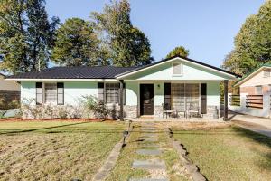 a home with a green and white house at Colorful & Cozy 3 Bedroom in Columbus in Columbus