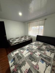 Postel nebo postele na pokoji v ubytování Hermosa finca + 13 fotografií