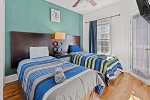 Postel nebo postele na pokoji v ubytování Beach loft