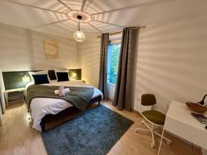 Postel nebo postele na pokoji v ubytování Le Patis