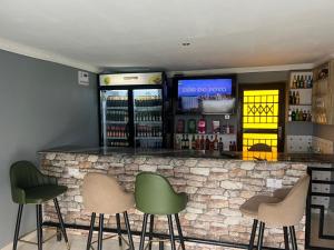 Lounge nebo bar v ubytování Kings Nest Lodge