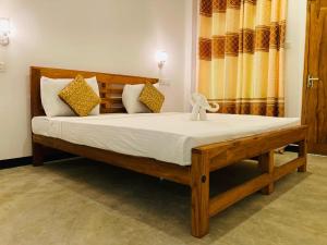 Postel nebo postele na pokoji v ubytování The river face safari resort