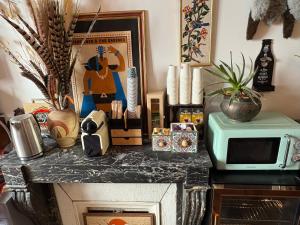 Η κουζίνα ή μικρή κουζίνα στο Chambre rétro +2 φωτογραφίες