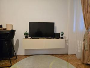 TV a/nebo společenská místnost v ubytování Sena