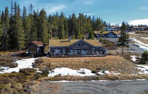 an aerial view of a house in the woods at Amazing Home In Gålå With Sauna in Gålå
