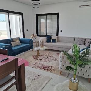 Posezení v ubytování Villa Haute standing à coté plage Hassi jerbi