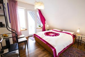 Ένα ή περισσότερα κρεβάτια σε δωμάτιο στο Ferienwohnung Auf Dem Schönen Felde +16 φωτογραφίες