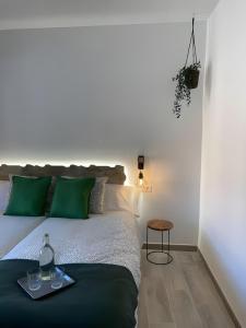 a bedroom with a bed with a tray on it at Habitación L'Elefant en Casa Camí de les Aigües Monistrol de Montserrat in Monistrol +4 photos