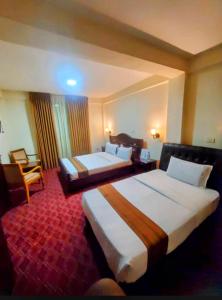 Postel nebo postele na pokoji v ubytování Keba Guest House