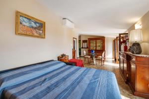 Postel nebo postele na pokoji v ubytování Casa Solarolo