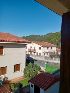a view of a building and a swimming pool at Chalet adosado entre playas in Argoños +8 photos