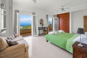 Ένα ή περισσότερα κρεβάτια σε δωμάτιο στο Panorama Julia