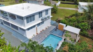 an aerial view of a house with a swimming pool at Casa Anastasia Beachside Villa with Pool in Vieques