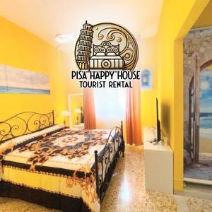 a bedroom with a bed and a sign that reads pizza happy house tourist rental at Pisa Happy House in Pisa